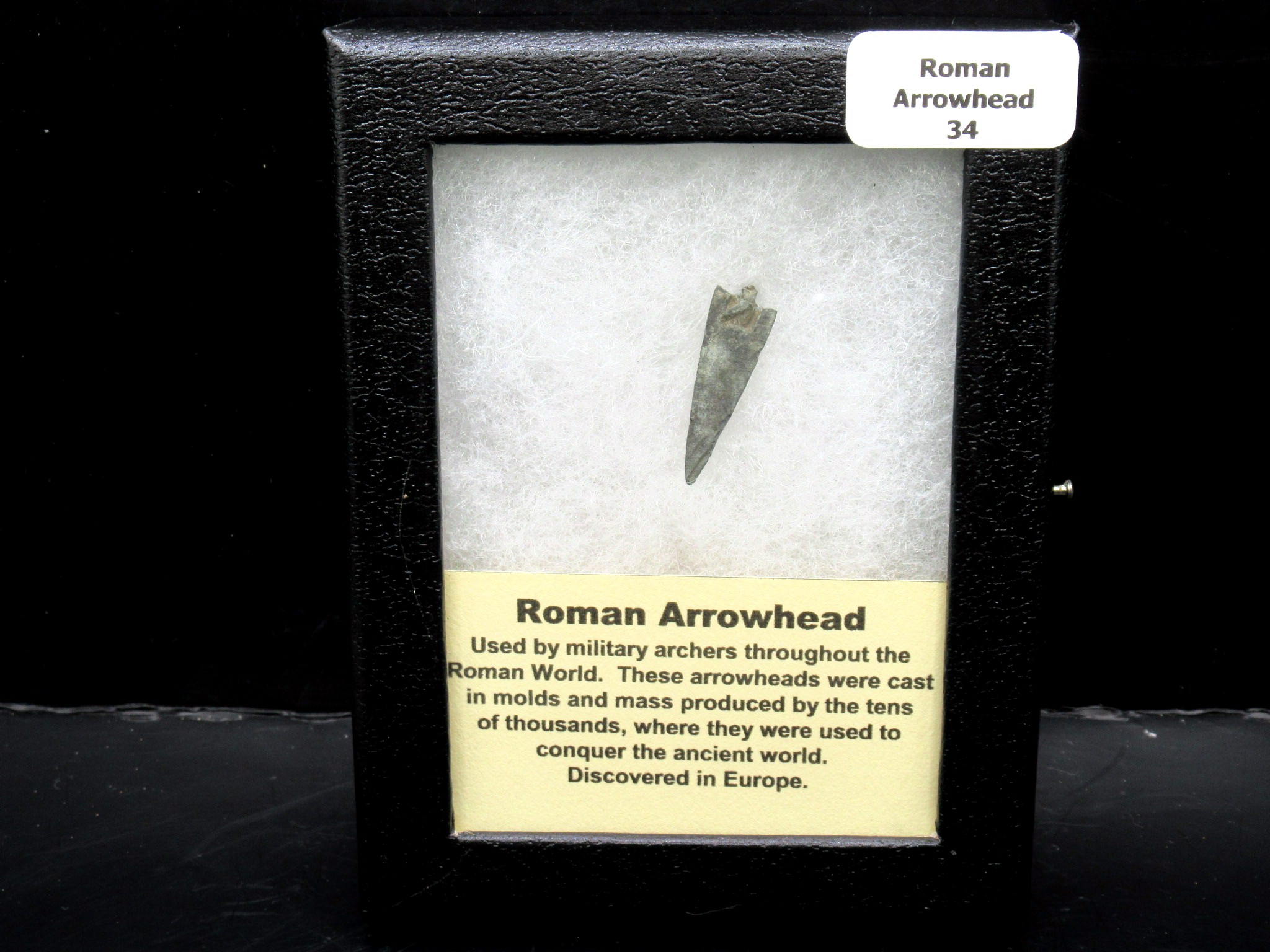 Genuing Roman Arrowhead in Riker 34 | Fossils for Sale Genuine Roman Arrowhead In Riker For Sale #34